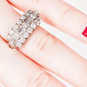 A breathtaking 1950s estate diamond band in 14kt white gold